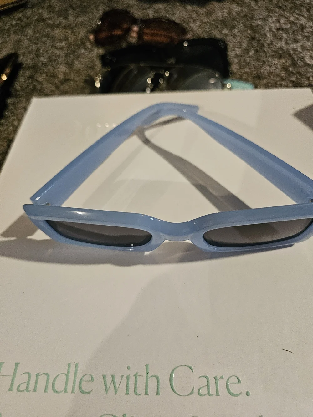Women’s Rectangular Light Blue Sunglasses with Dark Lenses